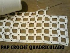 a crochet pattern is shown on the table next to a roll of thread