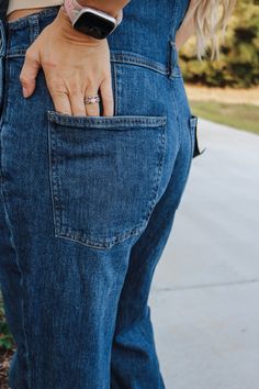 Everyone needs a classic pair of denim overalls in their closet, and style is exactly that. It features a baggy chic fit through the waist, hip and thigh. Classic details like a bib pocket and adjustable suspender straps give it an authentic look. Finished with a straight leg. Straight leg overalls with a medium indigo wash 12.5" mid rise Low Stretch denim that looks authentic with added stretch for comfort Adjustable straps, three side buttons, and a front bib pocket Straight Leg Overalls, Overall Jeans, Denim Overalls, Stretch Denim, Mid Rise, Adjustable Straps, Overalls, That Look, Straight Leg