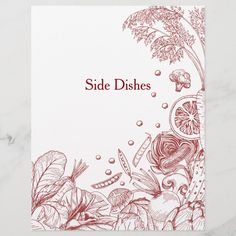 the side dishes cookbook is shown on a marble surface with an illustration of vegetables and fruits