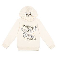 a white hoodie with an owl on the front and words that say, waiting for letters from hogwartts