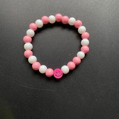 Glass beaded bracelet with smiley face. Pink Smiley Face, Pink Smiley, Glass Beaded Bracelet, Glass Beaded Bracelets, Smiley Face, Beaded Bracelet, Smiley, Favorite Jewelry, Glass Beads