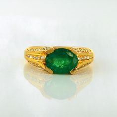 Add this beautiful emerald & diamond ring to your jewellery collection. This ring can be worn as a single one, or as stacks. Makes for a great gift. We used natural gemstones of the finest quality. Product Details > Gemstone - Emerald & Diamond > Materials - 18K Yellow Gold > Gemstone Shape - Oval > Gemstone weight - 1.75 carats Approx >Diamond weight - 0.32 carats Approx > Number of gemstone - 1 pcs > Ring Size 6 1/2 US > Gross Weight - 5.970grams > Setting type - prong & pave setting >gemstone Vintage Emerald Ring, Sapphire Jewelry Set, Sapphire Diamond Pendant, Emerald Ring Vintage, May Birthstone Rings, Victorian Pendants, Bezel Earrings, Mens Rings, Fine Jewelery