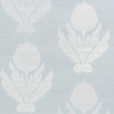 a blue and white wallpaper with flowers on it