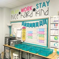 a classroom with desks and writing on the wall