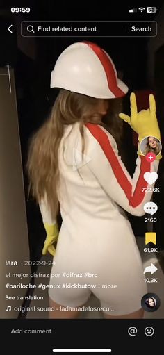 the girl is wearing a white dress and yellow gloves