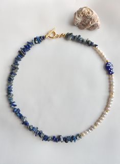 Royal Blue Necklace, Lapis Lazuli Natural Stone Necklace, Freshwater Pearl Necklace with Ceramic Charm, Halloween Gift 💙 Buy 2 Jewelry Items and Get 1 FREE 💙 CODE: FTM1FREE If you add 3 items to your cart and apply the store coupon code GET1FREE at checkout, you'll receive a 33% discount, making one item free. The adorable Freshwater Pearl and Blue Beaded Lapis Lazuli Chip Necklace, with a tiny ceramic fish detail, is perfect for your loved ones or yourself! It is made with love just for you! Tiny Pearl Jewelry, Blue Necklaces With Natural Stones For Gift, Handmade Blue Lapis Lazuli Necklace, Blue Beaded Necklaces With Natural Stones As Gift, Blue Beaded Necklaces As Gift, Blue Natural Stones Beaded Necklace For Gift, Handmade Royal Blue Round Beads Jewelry, Handmade Blue Beaded Necklace As Gift, Handmade Blue Beaded Necklace Gift