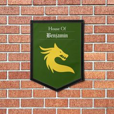 a sign on the side of a brick wall that says house of benjamin