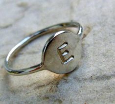 If you are looking for a perfect personal gift, this engraved initial ring is the pieace you are looking for. Made of sterling silver and hand stamped. A delicate design. Teen girls will love it. Great as a birthday gift or mother and daughter rings. You can see here the 14 karat gold version: https://www.etsy.com/il-en/listing/215715943/initials-ring-letter-ring-personal-gift Delicate Silver Rings, Silver Initial Ring, Daughter Ring, Ring Initial, Stamped Ring, Hand Stamped Ring, Teen Jewelry, Engraved Initials, Stamped Rings