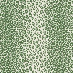 a green and white animal print fabric