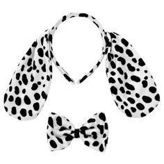 two black and white bow ties on top of each other, one in the shape of a dalmatian print