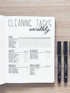 three black pens sitting on top of a paper with the words cleaning tasks written in it