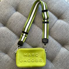 Marc Jacobs Flash Leather Crossbody Bag! Nwot - Rare!!! Absolutely Stunning Lime Green Color! Description: Single Detachable, Adjustable Crossbody Strap - Approx. 12.5-25" Strap Drop Zip-Top Closure Exterior Features Large Brand Logo Detail Interior Features 1 Slip Pocket, Printed Lining Approx. 6.5" H X 8.5" W X 3" D Style Marc Jacobs M0014465 - Flash Leather Crossbody Bag Green Crossbody Bag With Logo Strap, Rectangular Shoulder Bag With Logo Strap For Shopping, Trendy Crossbody Shoulder Bag With Logo Strap, Green Crossbody Bag Strap For Travel, Rectangular Travel Bags With Logo Strap, Rectangular Travel Bag With Logo Strap, Rectangular Bag With Logo Strap For On-the-go, Crossbody Bag With Logo Strap For Daily Use, Rectangular Camera Bag With Logo Strap For Everyday Use