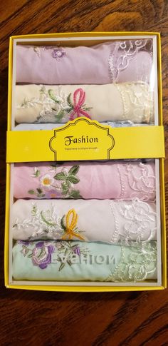 "Ladies handkerchiefs; This is a gift box with 6 pastel colored cotton handkerchiefs. Each handkerchief has some flowers embroidered and some lace on one corner.  They are lovely! All cotton, except for the lace. They measure approximately 11\" square.   Use for weddings, funerals, sachets, or noses.  Many different uses, and they make great gifts.  They are a very nostalgic item for the elderly." Ladies Handkerchiefs, Gift Suggestions, Gift Packs, Sachets, Embroidered Flowers, Scarf Accessory, Gift Box, Great Gifts, Pastel