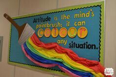 a bulletin board with a paintbrush and rainbow streamers on it that says attitude is the mind's paintbrush, it can cook any situation