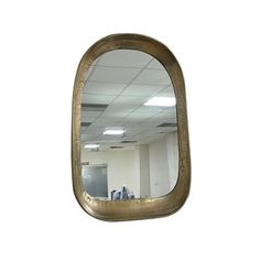 a mirror hanging on the wall in an office