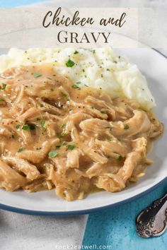 chicken and gravy on a plate with mashed potatoes