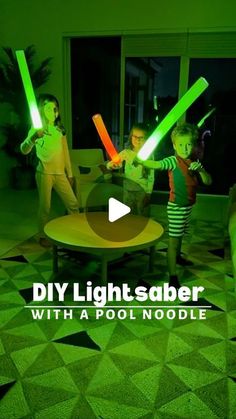 two children are playing with lightsabers in the living room, while an adult watches