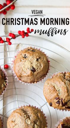 vegan christmas morning muffins on a wire rack with berries and cranberries