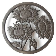 metal sunflowers in a circle on a white background