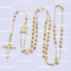 Real 14K  Yellow gold Rosary with crucifix chain necklace.  Weight of the chain  :10.80 grams Width   : 3.7 mm  Sizes    :24 inches Check out my other items! classic " lobster" clasp  All Solid Gold are 100% genuine. (Not plated)  Be sure to add me to your favorites list! #HHHNS-051324-15126 Gold Rosary Necklace, Gold Rosary, Catholic Jewelry, Rosary Necklace, Favorites List, Fine Jewellery Necklace, Rosary, Favorite Things List, Lobster Clasp