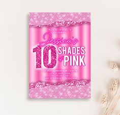 a pink birthday party card with the number ten on it and sparkles in the background