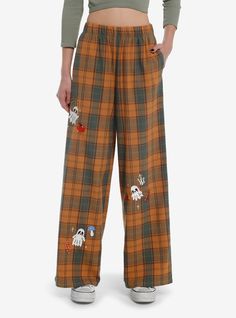 Drift off into the spirit realm with these spooky pajama pants! This pair has an orange and green plaid design  and features embroidered kawaii ghosts  mushrooms and pumpkins on the legs. Comes with side seam pockets and an elasticated waist band.97% cotton; 3% spandexWash cold; dry lowImportedListed in men'sunisex sizesModel is 5'10''Model wears size Small Cute Couple Christmas Pajamas, Fall Pajamas, Halloween Pajama Pants, Halloween Chic, Boo Baskets, Girls Loungewear, Spirit Realm