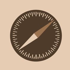 a brown and white compass with a long shadow on the top of it's face