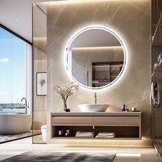 a bathroom with a large round mirror above the sink