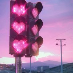 a traffic light that has hearts on it