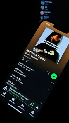 an image of a cell phone with music playing on the screen