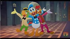 the three cartoon characters are dancing together