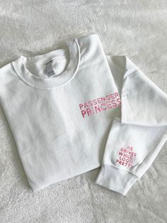 Let everyone know you're a passenger princess with this super cute trending shirt! Handmade in USA with embroidered stitching. Material: 50/50 Cotton, Poly Blend Slight Stretch Elastic/Knit Trim Fit:  Both sweatshirts and T-Shirts are Unisex Care: Machine wash cold. Tumble Dry Low Trendy Long Sleeve T-shirt With Embroidered Logo, Trendy Long Sleeve Top With Embroidered Logo, Trendy Embroidered Long Sleeve T-shirt, Trendy Long Sleeve Embroidered T-shirt, Trendy Long Sleeve T-shirt With Embroidered Text, Trendy Custom Embroidery Tops For Streetwear, Long Sleeve T-shirt With Embroidered Text, Spring Streetwear Tops With Custom Embroidery, Princess Hoodie