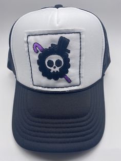 One Piece Jolly Roger (Brook): 100% hand embroidered patch sewn into white/black trucker hat. Sanji Jolly Roger, One Piece Jolly Roger, Big Mom Pirates, Black Trucker Hat, Handmade Patch, Cool Boats, Jolly Roger, Newport News, Black Legs