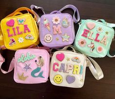 "Are you tired of the same old boring lunch bags? Look no further! Our personalized lunch bags are here to add a pop of color and originality to your day. Get ready to turn heads and make a statement with our vibrant and unique designs. Whether you're going to camp, sporting activities, or heading back to school, our lunch bags are the ideal companion. They combine fun and functionality, ensuring that you not only have a stylish bag but also a practical one. The adjustable shoulder straps make it easy to carry around, and the personalization feature makes it difficult to lose. LUNCH BAGS Colors available: - Mint - Pink - Cream - Lilac - Yellow Measurements: - 11\"H 9.5\"L x 3\"W  Materials: - 100% nylon, and insulated to keep your food cold and fresh for longer. PATCHES: - Letters (lunch b Lunch Bag Ideas, School Bag Design, Personalized Lunch Bags, Bag Names, Kids Lunch Bags, Kids' Bag, Insulated Bags, Lunch Bags, Party In A Box