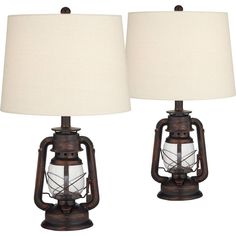 two lamps that are sitting next to each other