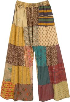 Bright, vibrant, and full of life, these sunny-happy-go-lucky pants are a wardrobe special. With an assorted array of multicolor recycled patchwork patterns, all pieced together cohesively bring a unique look to the pants. #tlb #SplitSkirtsPants #Patchwork #Striped #bohemianfashion #Handmade #GypsyWideLegPants Tie Dye Long Skirt, Turmeric Tonic, Patchwork Pants, Patchwork Clothes, Earthy Outfits, Hippie Pants, Estilo Hippie, Hippie Style Clothing, Trendy Skirts