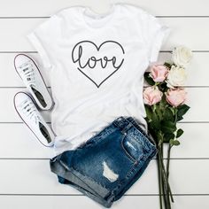 This timeless tee is such a perfect choice for any day! Featuring love heart artistic design on a white tee! This tee is such a cute casual look for casual days! The material is lightweight and soft - it's so comfortable to wear! Just pair with your favorite jeans and sunnies! It's also great for layering with a cozy sweater, a light jacket in Spring, or denim shorts and sandals in Summer! •Cotton & Polyester Blend •Materials may have natural variations •Colors may vary from different viewin Oversize Sleeves, Y2k Aesthetic Outfits, Comfy Shirts, Bella Canvas Tees, Red T, Cozy Sweater, Red Tshirt, Heart Love, White Tee