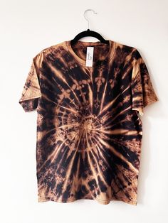 "Bleach Tie Dye Swirl, Black Tie Dye T Shirt, Bleach Shirt, Unique Tie Dye, T Shirt Unisex, Soft Cotton, Tie Dye T Shirt, Bleach Black Shirt Welcome to 102 Apparel! Your one stop shop for comfy and unique colourful clothing. -  Colour: Black Bleach Swirl - Available in multicolour combinations - All products are completely unique - Dyes are vegan and cruelty free - Breathable fabric - 100% Cotton - Colour placement may vary due to being handmade - Size up for baggy fit - All products are made to Cheap Black Camp Shirt With All Over Print, Cheap Casual Tie Dye Shirt, Cheap Trendy Bleached T-shirt, Casual Bleached T-shirt Cheap, Cheap Tie Dye Top For Summer, Cheap Bohemian Tie-dye Tops, Trendy Cheap Bleached T-shirt, Cheap Multicolor Grunge T-shirt, Cheap Bleached Black T-shirt