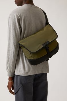 This is a must-have messenger bag for those on the go. Essentially weightless, this designed-for-utility messenger is made in a nylon-poly blend and features a hidden back zip pocket. The Messenger is padded for comfort. Inside, there are compartments for laptops and headphones protected by a flexible hardcover front flap. The cross-body strap features a no-slip shoulder pad, while a double-zip padded pouch allows quick-stash access. #B0911436-82048 Fabric: 100% polyester The Utility Messenger B Casual Nylon Laptop Bag For On-the-go, Casual Nylon Laptop Bag For Commuting, Casual Nylon Laptop Bag With Zipper Pocket, Nylon Shoulder Bag For Outdoor Activities, Nylon Shoulder Laptop Bag With Adjustable Strap, Nylon Laptop Bag With Adjustable Strap, Nylon Shoulder Bag With Removable Pouch For Commuting, Nylon Satchel With Adjustable Strap For Everyday Use, On-the-go Nylon Laptop Bag With Adjustable Strap