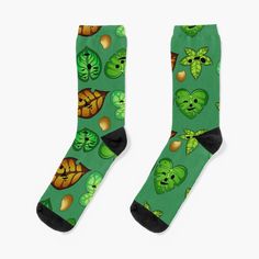 Super soft all-over printed knit socks with extra cushioning in the sole. Suitable for men and women. Zelda Socks, Korok Plush, Plush Store, Video Game Print, Green Socks, Green Carpet, Knit Socks, Socks For Sale, Knitting Socks