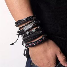 5 Pcs Set Punk Rock Feather Leather Braided Rope Bracelets Layer This Set Of Black Leather Bracelets For A Unique Look. Each Bracelet Is Different, But They All Compliment Each Other. Whether You Are Wearing One Or All Five, It’s An Awesome Way To Pull Together An Edgy Look! The Black Leather Straps Have 5 Different Looks. Two Are Multilayered With A Thick Black Leather Strap Down The Center And Braided Black Chording On The Outer Edges. One Is Studded With Gunmetal Stars, And One Has A Large Gu