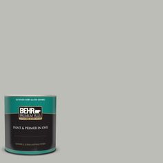 a can of behr paint on a white background