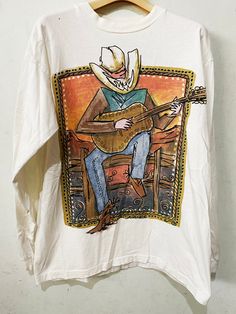 "Brand: Sunset Serenade Cowboy Size: M-L Made In USA Measurements are taken with the garment laying flat. Chest width: 20\" Body Length : 26\" Sleeve Length: 28.5\" Condition: Pre-owned 8.5/10 Material: 100% Cotton Comment Have hole No refund. -Payment : accept paypal only -Shipping : to shipping worldwide by registered airmail (small package) Thai post registered. receiving the item within 7-30 business days non sat-sunday working after payment cleared (some case in Australia/italy/spain/north Shirt Inspiration, Cowboy Shirt, Vintage Sunset, Country Concert Outfit, Cowgirl Chic, Cowboys Shirt, Country Concert, Vintage Cowboy, Vintage Paris