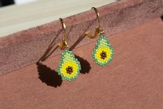 Cute small earrings Avocado the best for your summer outfit 100% handmade  For people who loves nature Hypoallergenic Beaded Earrings With Round Beads For Summer, Summer Hypoallergenic Earrings With Round Beads, Cute Beaded Earrings For Summer, Handmade Beaded Teardrop Earrings For Summer, Handmade Teardrop Beaded Earrings For Summer, Yellow Beaded Earrings As Summer Gift, Summer Teardrop Earrings With Tiny Beads, Teardrop Earrings With Tiny Beads For Summer, Bohemian Hypoallergenic Beaded Earrings For Summer