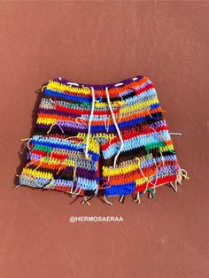 multicolored crocheted shorts with white drawstrings on the bottom