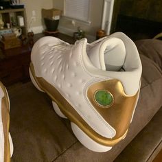 Never Worn White And Gold Jordans White Leather Jordan Shoes With Perforations, Gold Leather Basketball Shoes, Gold Leather Round Toe Basketball Shoes, Luxury White Sneakers With Cushioned Footbed, Luxury Leather Jordan Shoes With Round Toe, White Leather Jordan Shoes With Branded Heel Counter, Gold Jordans, Jordan 4 White, Red Basketball Shoes