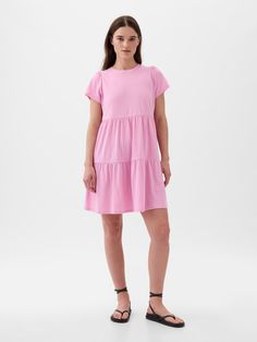 Soft, cotton-blend mini dress.  Crewneck.  Short sleeves.  Tiered skirt.  * Fit: Relaxed.  An A-line silhouette that's easy through the chest with a flared opening.  Hits above the knee.  Models wearing Gap Casual Pink Dress, Pink Cotton Dress, Tiered Mini Dress, Barbie Birthday, Women Outfits, Casual Clothes, Tier Skirt, Tiered Skirt, Tiered Dress