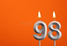 Number 98 - Silver Anniversary candle on orange background stock images 98th Birthday, Anniversary Candle, Silver Anniversary, Orange Background, Stock Images, Candles