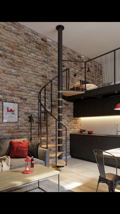 a living room filled with furniture and a spiral staircase in front of a brick wall