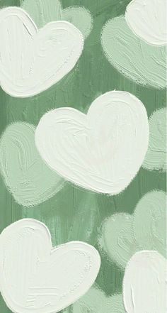 an abstract painting with white hearts on green background